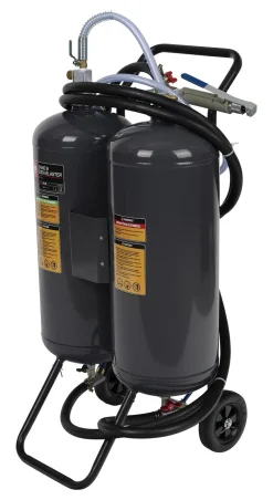 Hiekka- ja soodapuhalluslaite