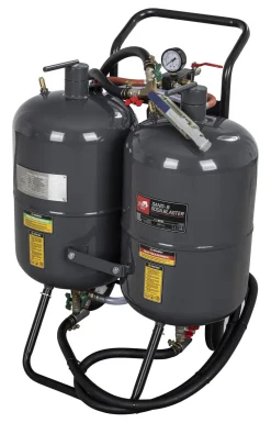 Hiekka- ja soodapuhalluslaite